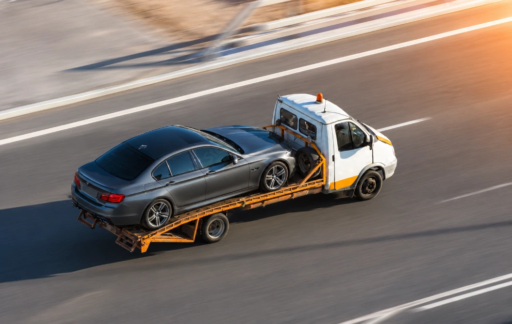 Flatbed Towing Service (خدمة السحب بالونش المسطح)